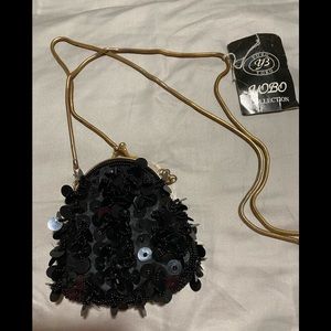 Black sequin evening pouch bag